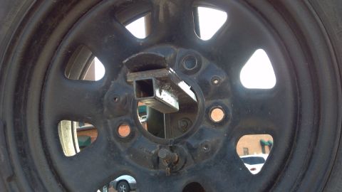 1986 Ford Bronco - Spare tire mount, minus the license plate bracket.
