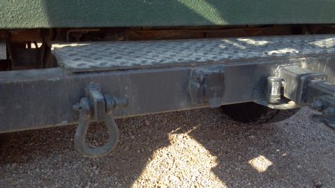 1986 Ford Bronco - Rear bumper: D-ring mounts the trailer electrical hookup.