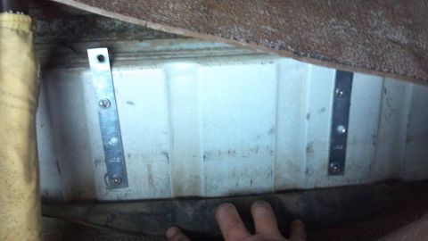 1986 Ford Bronco - These backing plates support the air tank. This is the hump under the rear seat.
