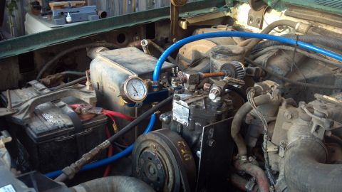 1986 Ford Bronco - York 210 R air conditioning compressor from a '69 IH Travelall. I removed the smog pump, leaving the bracket in place. One air line runs to…
