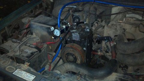 1986 Ford Bronco - Here's the York mounted to the bracket, air lines all hooked up, and heater hoses re-routed. All that's left is the electrical hookup, the…