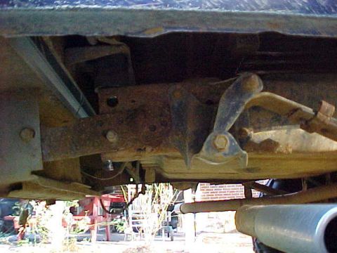 1989 Ford F-150 - Undercarriage view of a 1989 Ford F-150, highlighting frame and suspension parts.