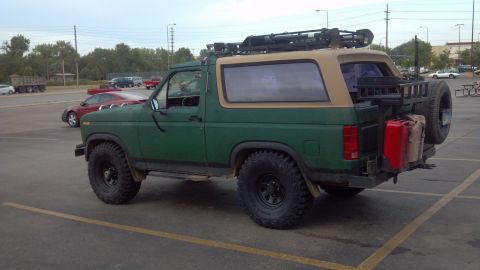 1986 Ford Bronco - Now with Goodyear Wrangler MTR 35\\" tires on stock rims. No lift. Still looks good, nice beefy tires.
