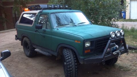 1986 Ford Bronco - Sitting at home with the new shoes. Wheels are cranked all the way over, and this is where it starts to rub on the sway bar and radius arms…