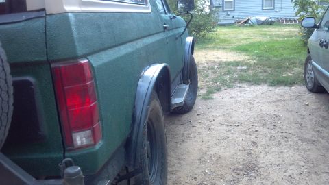 1986 Ford Bronco - I thought i'd improve matters a bit. Been fighting rust since day one around the wheel wells, so I opted to cut it out, cutting at the firs…