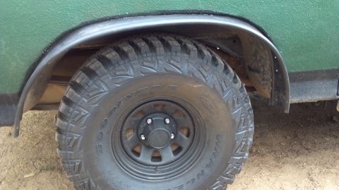 1986 Ford Bronco - About an hour for each wheel well to cut away the metal, shape and bend it, prime it, then to fasten the edging and caulk the gap.
