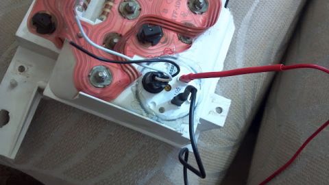 1986 Ford Bronco - Glued in place. The white and black wires will be attached the backside of the gauge cluster to give illumination, the red and black wire r…