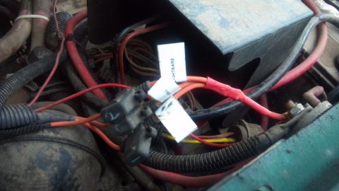 1986 Ford Bronco - 8 ga wire coming from the starter solenoid, then feeding into fuse holders for each 10 ga circuit. Labels are your friend