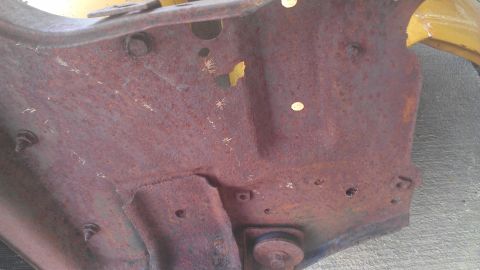 1973 Chevrolet Camaro - Close-up of a corroded metal part, likely from a vehicle's undercarriage.