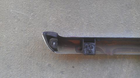 1973 Chevrolet Camaro - Close-up of a vehicle bumper part, likely from the front or rear.