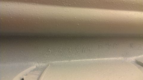 1973 Chevrolet Camaro - Close-up of a part showing stamped numbers 333974 DRC KZ, suggesting a 1974 manufacturing date.