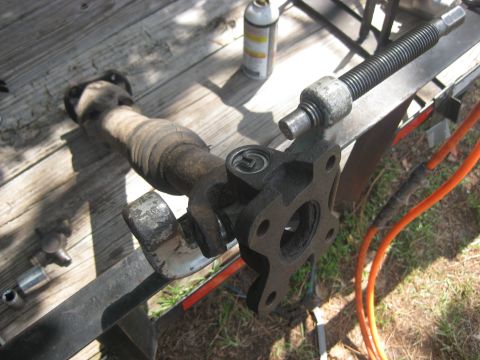 1994 Ford Bronco - A driveshaft component, likely for a vehicle, is shown disassembled.