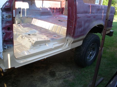 1983 Ford Bronco - Nice weather today, so I degreased the body, pressure-washed it, dried it, and then started spraying the Rustoleum Sand 7771 .
