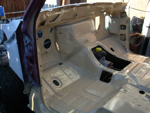 1983 Ford Bronco - Nice weather today, so I degreased the body, pressure-washed it, dried it, and then started spraying the Rustoleum Sand 7771 .