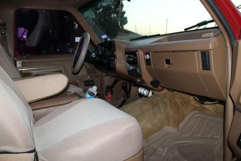 1990 Ford Bronco - Interior view of a 1990 Ford Bronco, highlighting the dashboard and seating.
