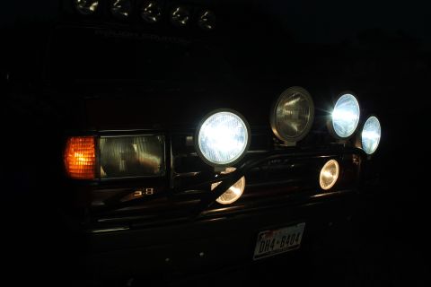 1990 Ford Bronco - Front view of a 1990 Ford Bronco's grille, equipped with auxiliary lights.