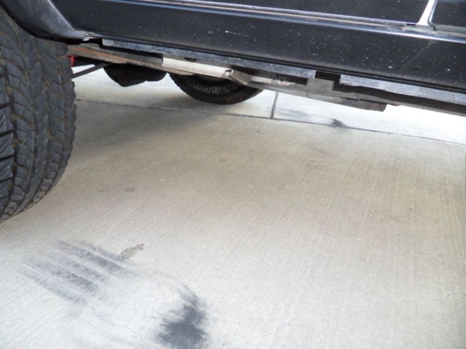 1994 Jeep Cherokee side view showing undercarriage and tire