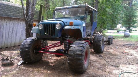 1978 Ford Bronco - This heavily modified Jeep CJ is sitting on massive tires and has a custom suspension setup.