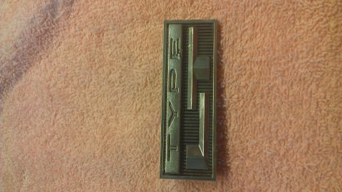 1973 Chevrolet Camaro - This emblem displays the word 'TYPE' vertically. It is a car part, not a 1973 Chevrolet Camaro.
