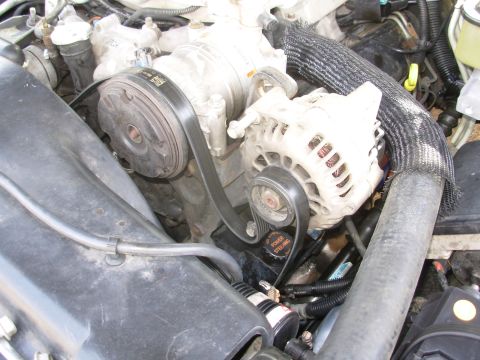 1997 Chevrolet Silverado 3500 - As a test, I moved my stock alternator to the optional location, and it bolts up. I just need some bracketry, an idler pulley w/spacer & bo…