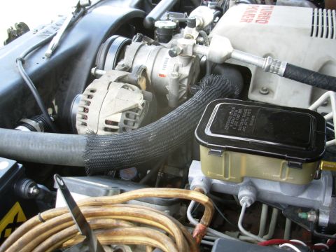 1997 Chevrolet Silverado 3500 - As a test, I moved my stock alternator to the optional location, and it bolts up. I just need some bracketry, an idler pulley w/spacer & bo…