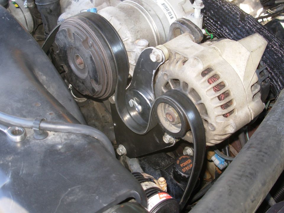 This is just the slack in the original (single-alternator) belt pulled over to represent the future routing.  The magnet is pretty close to the actual idler pulley's size.

http://www.dieselplace.com/forum/showthread.php?t=427664

The dual-alternator belt is 6 ribs 120.3" long; at [url=http://www.oreillyauto.com/site/c/detail/GAT9/K061203/]O'Reilly[/url], a [url=https://www.amazon.com/Gates-K061203-Multi-V-Groove-Belt/dp/B000C2UK3I]Gates Micro-V AT K061203[/url] is ~$52.
