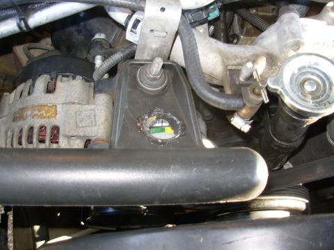 1997 Chevrolet Silverado 3500 - To get the tensioner off its hard stop temporarily, I stacked 3 washers under each bolt of the A/C compressor. After the dual alternator mo…