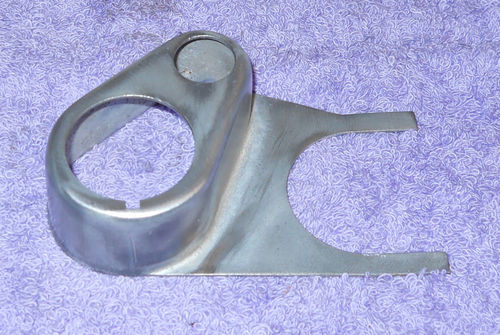 Metal gauge cluster bezel with two circular openings