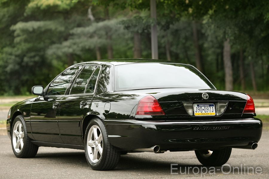 2003 Mercury Marauder rear view, black paint, license plate J90-097J