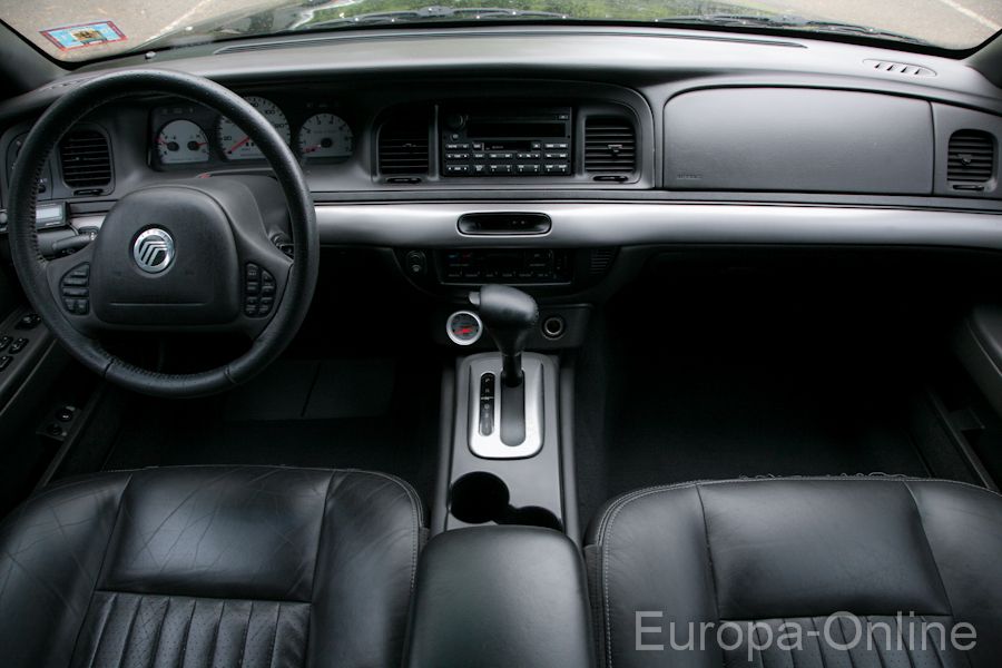 2003 Mercury Marauder interior showing dashboard, steering wheel, center console, and leather seats