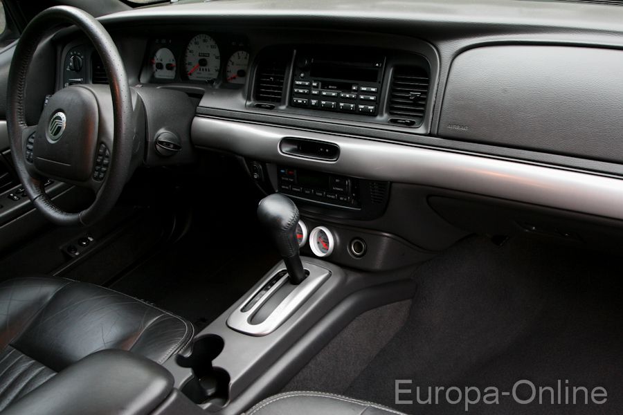 2003 Mercury Marauder interior showing dashboard, steering wheel, shifter, and gauges