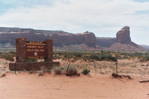 1991 Ford LTD Crown Victoria - Entrance sign for Monument Valley Navajo Tribal Park, established 1957.