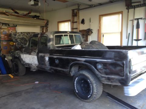 1979 Ford F-350 - This 1979 Ford F-350 truck is undergoing bodywork in a garage.