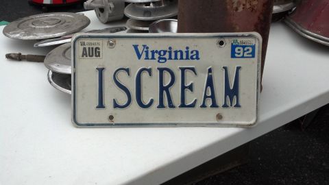 2007 Ford Mustang - Virginia license plate with the personalized text ISCREAM and an expiration sticker for August 1992.