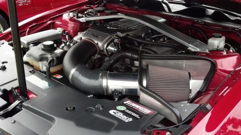2007 Ford Mustang - Close-up of a modified Ford Mustang engine bay, showing custom performance parts.