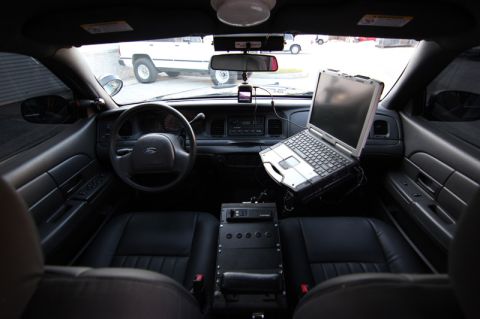 2004 Ford Crown Victoria - Interior view of a 2004 Ford Crown Victoria police car equipped with a laptop computer.