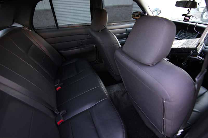 Interior view of a 2004 Ford Crown Victoria showing rear seats and dashboard
