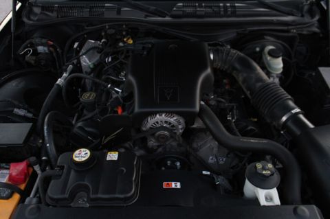 2004 Ford Crown Victoria - The engine compartment of a 2004 Ford Crown Victoria P71, its V8 engine and associated components.