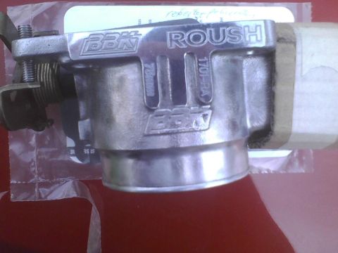 2003 Ford Crown Victoria - Close-up of a BBK Performance throttle body Roush branding and part numbers.