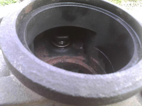 2003 Ford Crown Victoria - Engine valve and spring assembly visible within a metal housing.