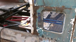 1978 Ford Bronco - This photo shows a heavily rusted vehicle door and frame, not a 1978 Ford Bronco.