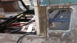 1978 Ford Bronco - This vehicle appears to be undergoing restoration or modification, with exposed metal and structural components visible.