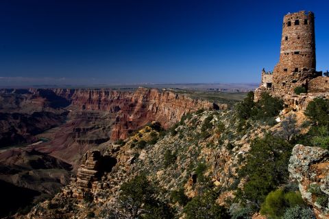 1991 Ford LTD Crown Victoria - The Grand Canyon stretches out under a vast blue sky, with the historic Desert View Watchtower perched on the edge.