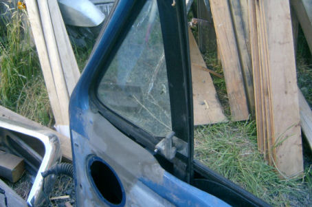 1989 Ford Bronco - Passenger wing window (inside)