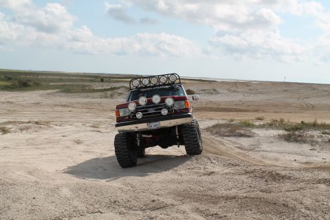1990 Ford Bronco - This 1990 Ford Bronco is equipped for off-road adventures in a sandy terrain.