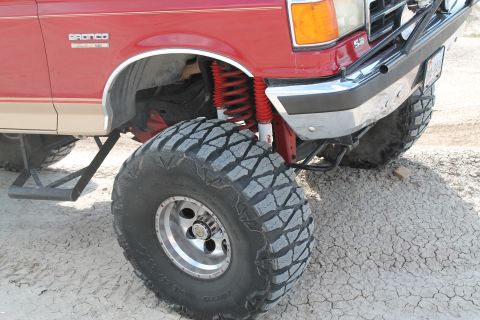 1990 Ford Bronco - This lifted 1990 Ford Bronco features aggressive off-road tires and suspension modifications.