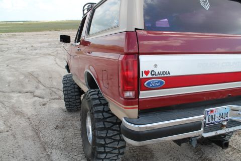 1990 Ford Bronco - This 1990 Ford Bronco is equipped with off-road tires and a lifted suspension, ready for adventure.