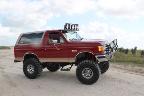 1990 Ford Bronco - This lifted 1990 Ford Bronco is ready for off-road adventures with its custom lighting and suspension.