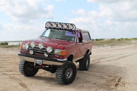 1990 Ford Bronco - This lifted 1990 Ford Bronco is equipped with multiple auxiliary lights for off-road adventures.