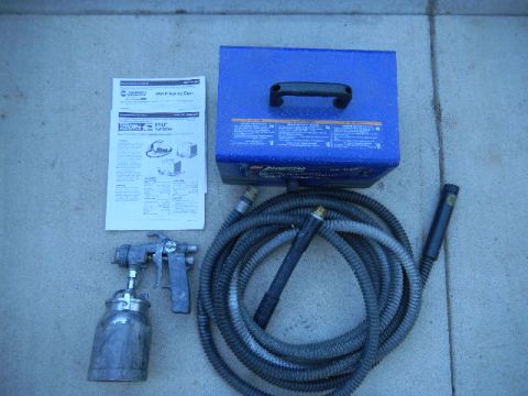 1997 Ford Ranger - Paint sprayer kit includes turbine, hose, and spray gun. Manual is also present.